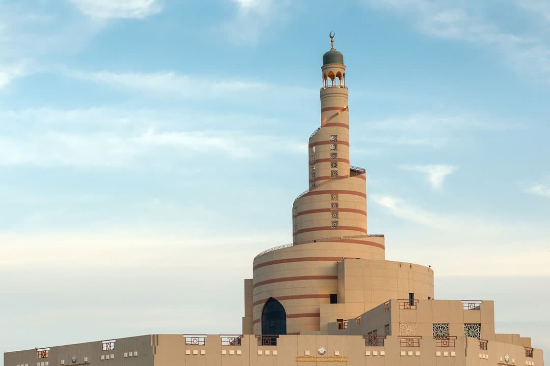 A calm Qatari mosque exterior for the mosque detail page
